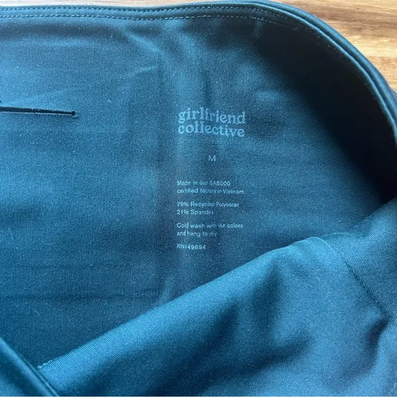 Medium Girlfriend Collective Bike Shorts In Orange and Dark Green - Picture 4 of 4